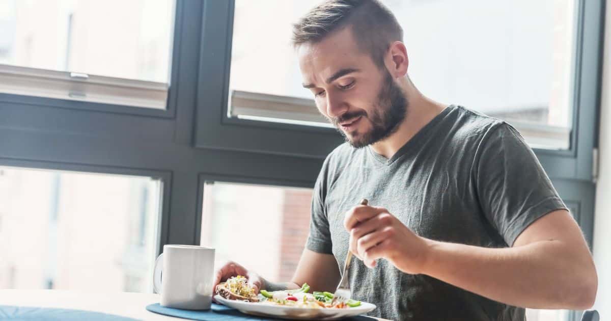 Man eating healthy meal promoting Semaglutide and Tirzepatide weight loss injections available at Admire Aesthetics in Medford, and Grants Pass OR